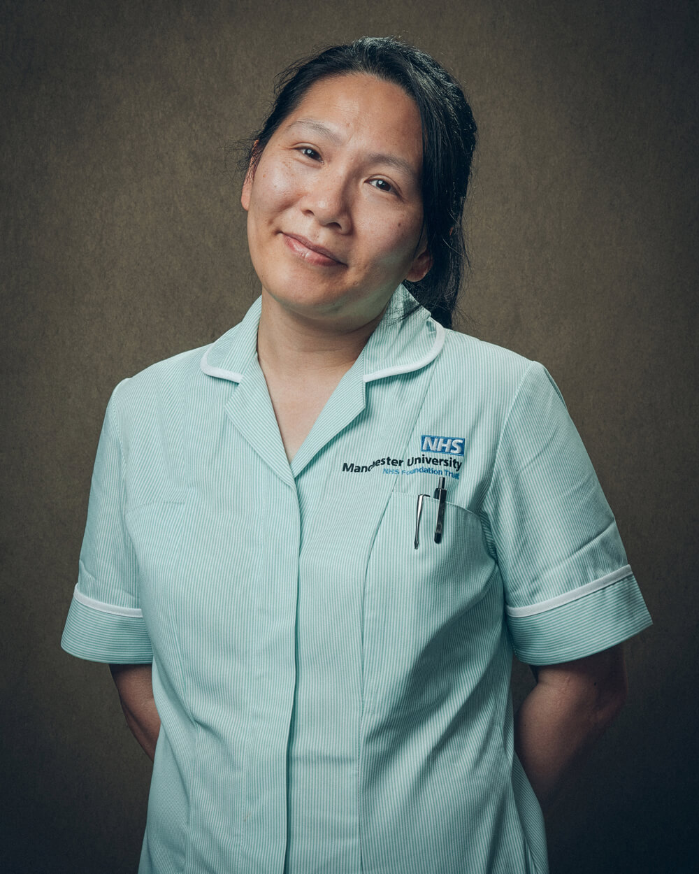 A portrait photograph of Katie Kirkham