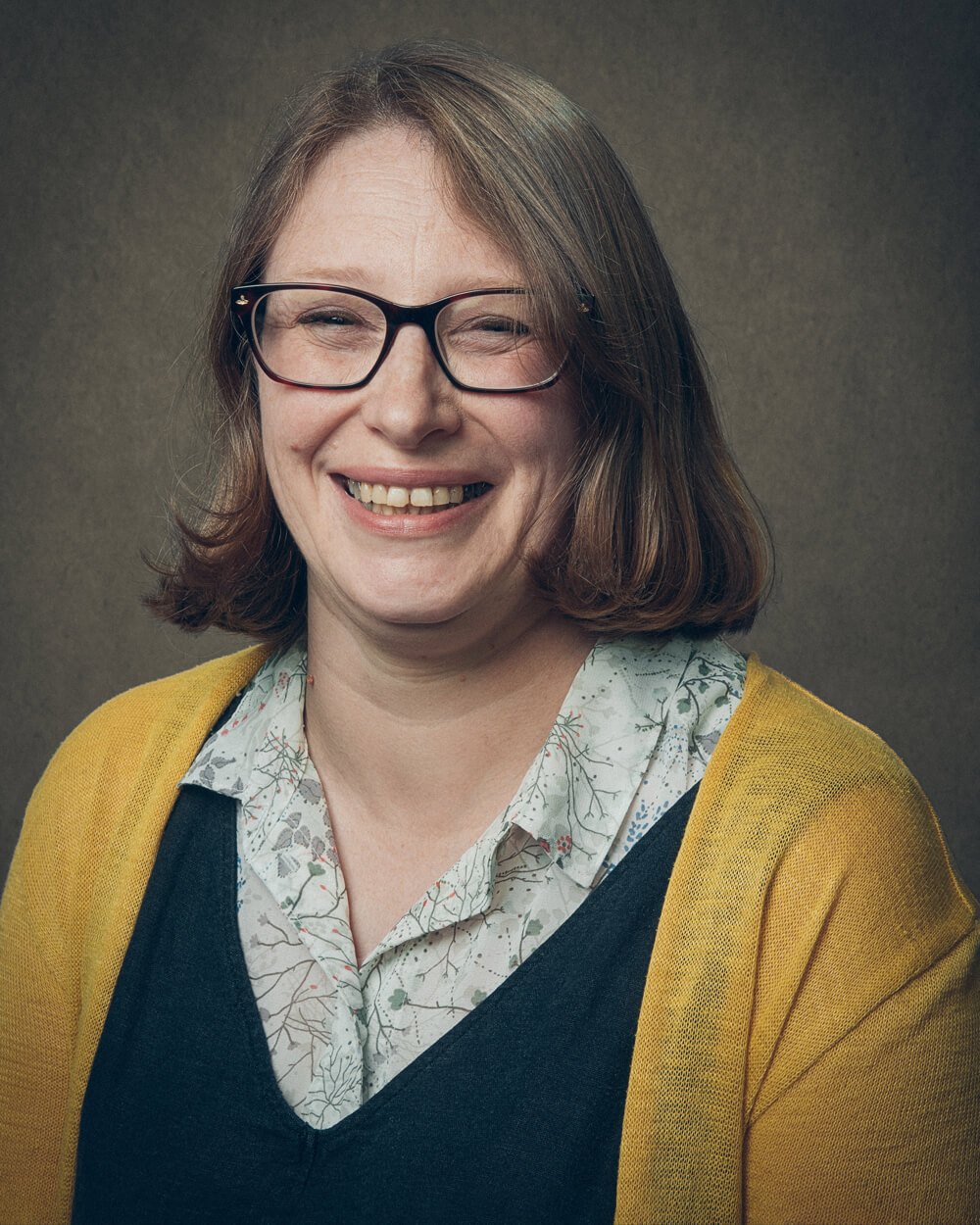 A portrait photograph of Michelle Dutton